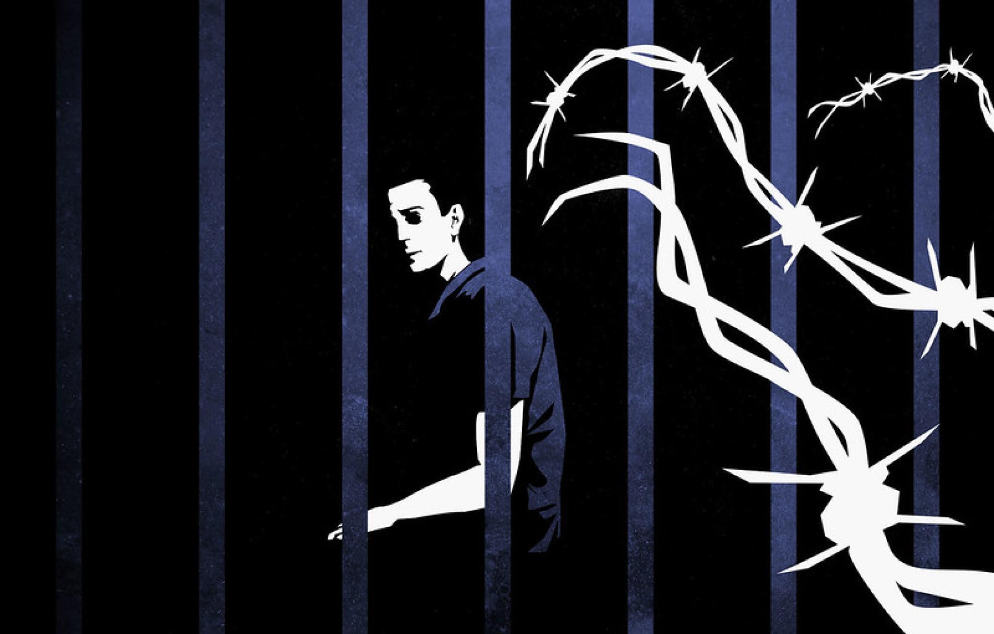 Image credit: stylized image of a prisoner behind bars and barbed wire by Jared Rodriguez of Truthout from https://flic.kr/p/2hdA8J3 (CC BY-NC-ND 2.0) 