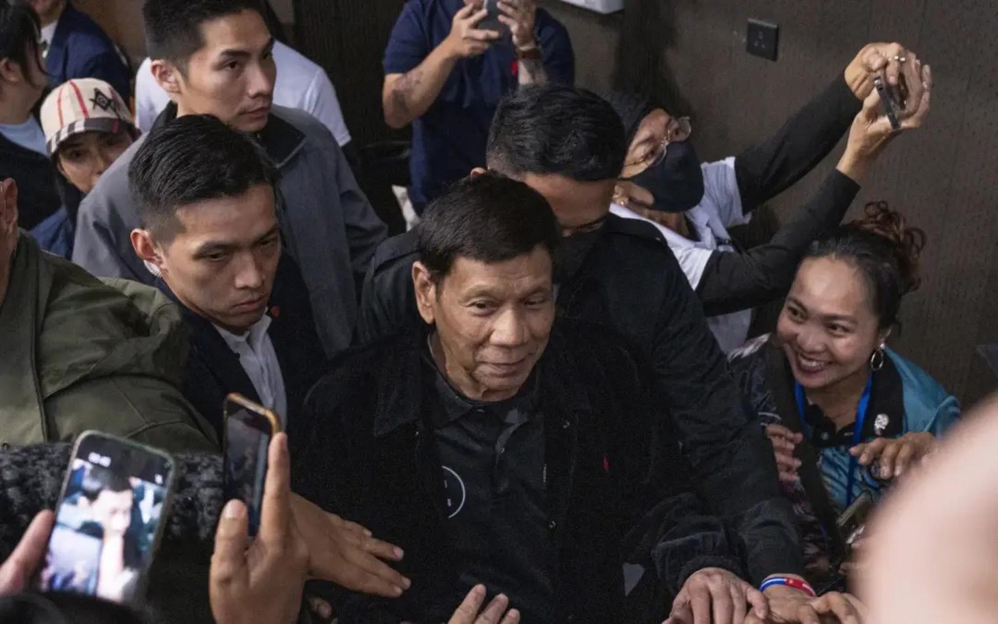 Former Philippines president Rodrigo Duterte arrives at Southorn Stadium during a thanksgiving gathering organised by Filipino workers in Hong Kong 