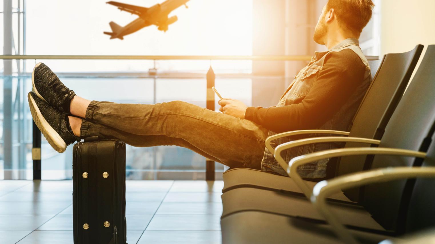 Photo by @jeshoots on Unsplash waiting at an airport
