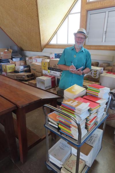 Matthew Spriggs doing the initial sort of the 900 books